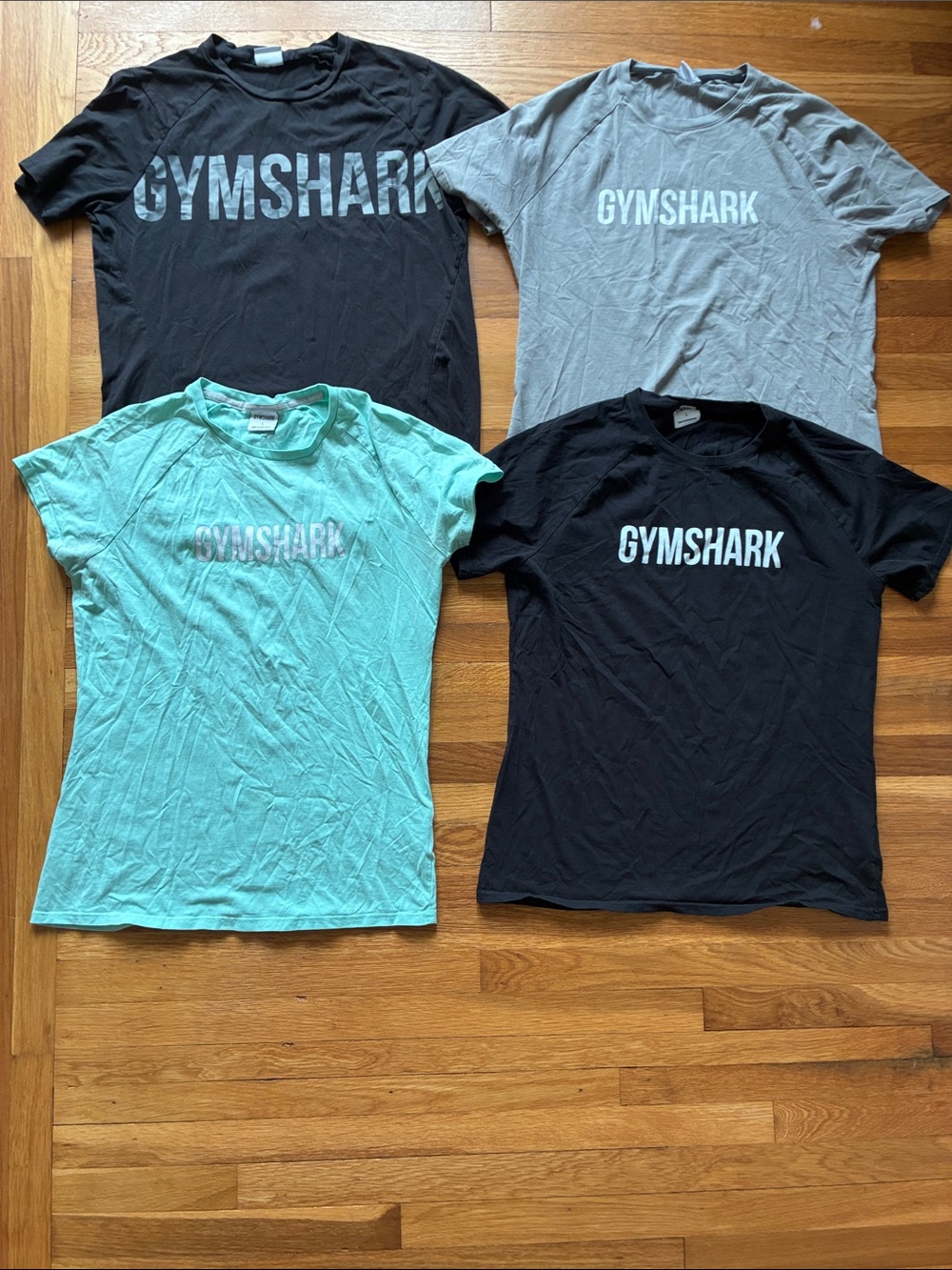Set of four men’s gymshark fitted t-shirts size large